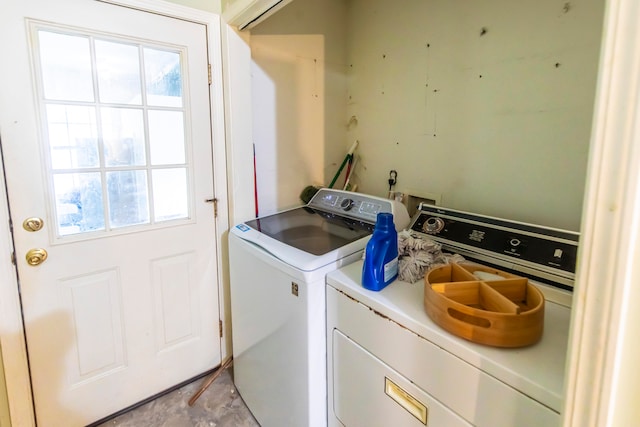 washroom featuring independent washer and dryer