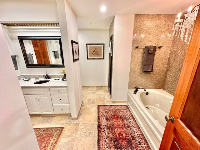 bathroom with vanity and a bathing tub