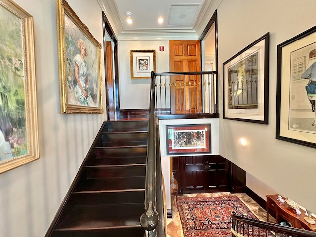 stairway featuring ornamental molding