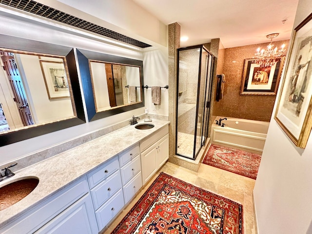 bathroom featuring vanity, a notable chandelier, and independent shower and bath