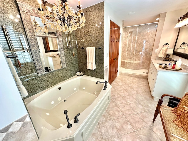 bathroom featuring vanity, separate shower and tub, a chandelier, and tile patterned flooring