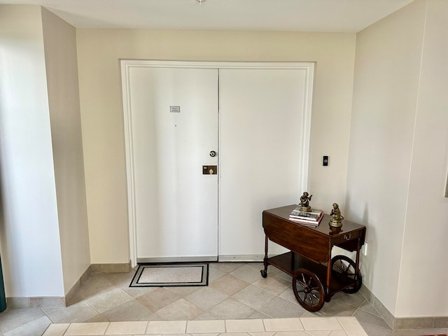 interior space with light tile patterned floors