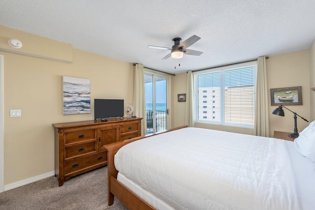 bedroom with light carpet, a textured ceiling, access to exterior, and ceiling fan