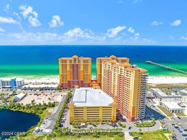 bird's eye view with a view of the beach and a water view