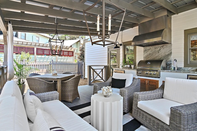 deck with outdoor lounge area, area for grilling, a sink, and a ceiling fan