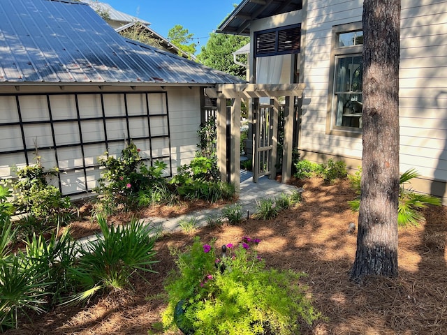 view of home's exterior with metal roof