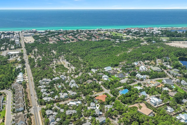 bird's eye view featuring a water view and a residential view