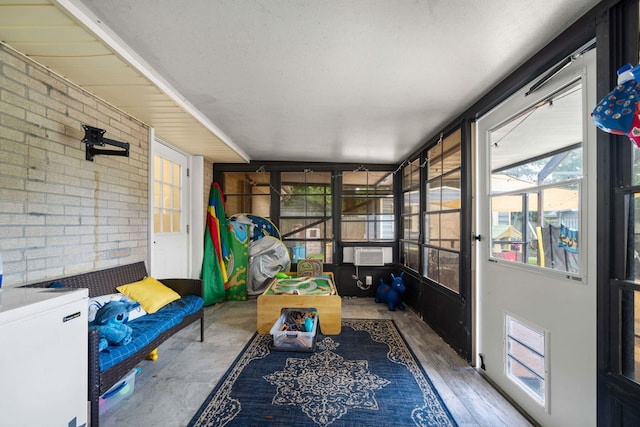 sunroom / solarium featuring cooling unit