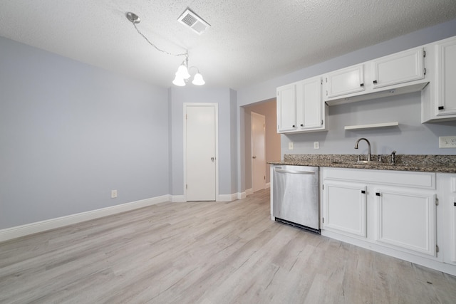 kitchen featuring white cabinets, dishwasher, light hardwood / wood-style flooring, and sink