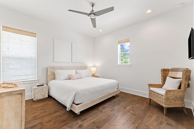 bedroom featuring dark wood-type flooring and ceiling fan