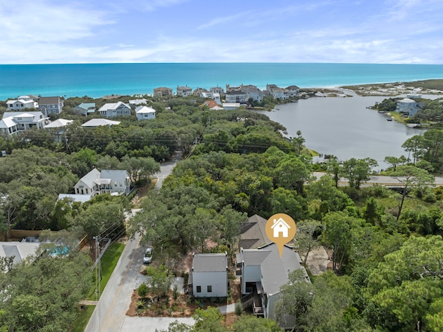 drone / aerial view with a water view