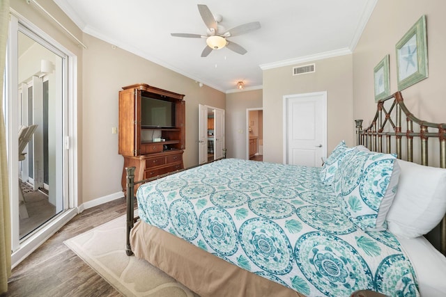 bedroom with crown molding, ceiling fan, visible vents, baseboards, and light wood-type flooring