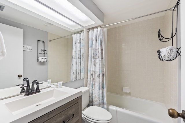 full bathroom with shower / tub combo, visible vents, vanity, and toilet