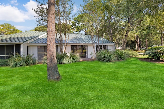 view of front of home with a front lawn