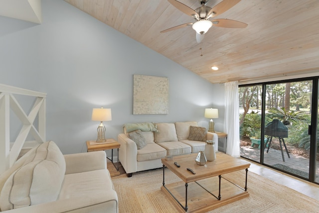 living room featuring lofted ceiling, wood ceiling, and ceiling fan