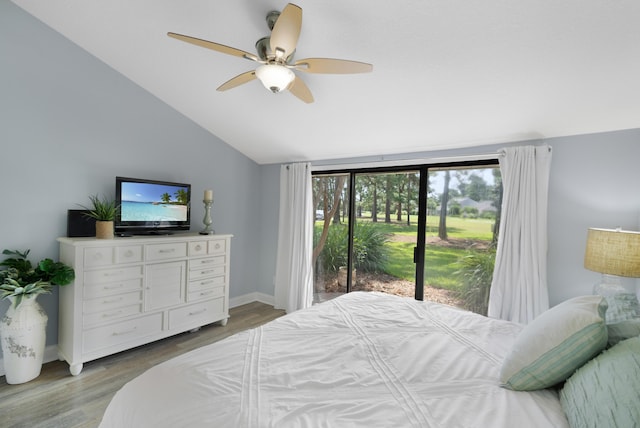 bedroom featuring lofted ceiling, hardwood / wood-style flooring, and ceiling fan