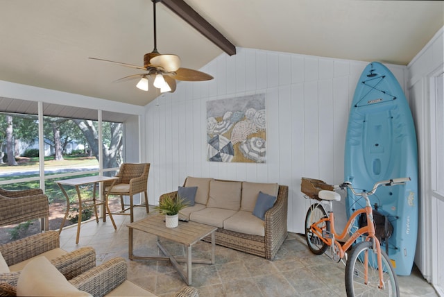 living room with vaulted ceiling with beams and ceiling fan