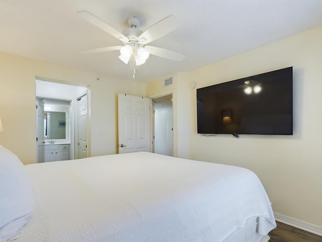 790 Santa Rosa Blvd Unit 3009, Fort Walton Beach, FL 32548 - bedroom with a ceiling fan, wood finished floors, ensuite bathroom, baseboards, and visible vents
