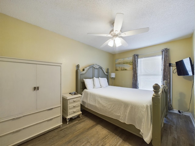 790 Santa Rosa Blvd Unit 3009, Fort Walton Beach, FL 32548 - bedroom with a textured ceiling, dark wood-type flooring, and a ceiling fan
