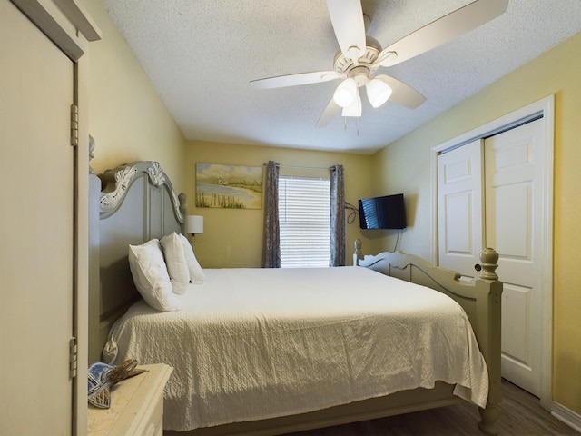 790 Santa Rosa Blvd Unit 3009, Fort Walton Beach, FL 32548 - bedroom featuring a textured ceiling, wood finished floors, and a ceiling fan