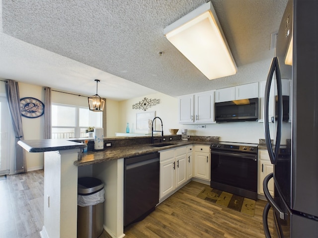 790 Santa Rosa Blvd Unit 3009, Fort Walton Beach, FL 32548 - kitchen with dark wood-style flooring, a sink, stainless steel appliances, and a peninsula