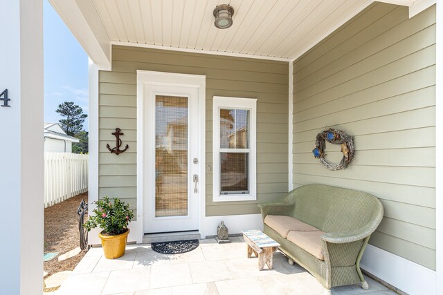 property entrance with a patio area