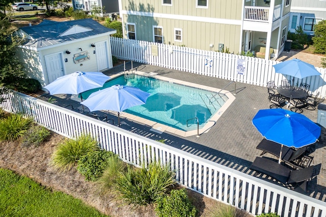 view of swimming pool featuring a patio