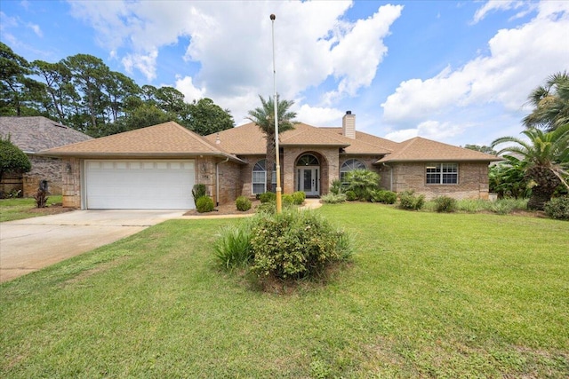 ranch-style house featuring a garage and a front yard