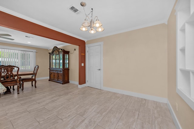 111 NW Sotir St, Fort Walton Beach, FL 32548 - dining area with visible vents, baseboards, ornamental molding, and ceiling fan with notable chandelier