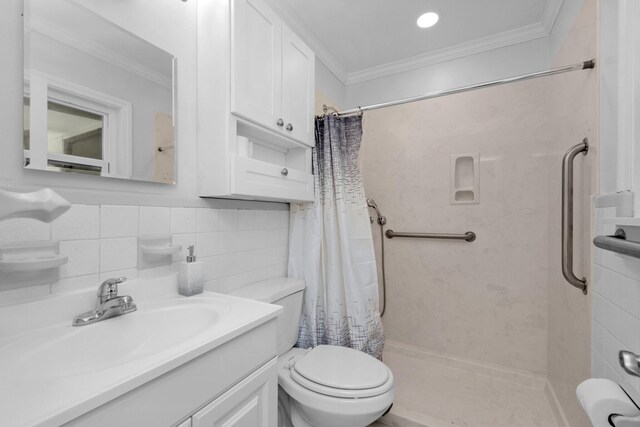 111 NW Sotir St, Fort Walton Beach, FL 32548 - full bath featuring ornamental molding, toilet, vanity, and a shower with curtain