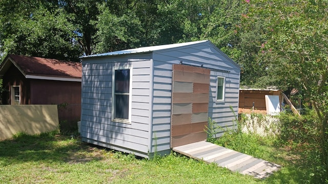 111 NW Sotir St, Fort Walton Beach, FL 32548 - view of shed featuring fence