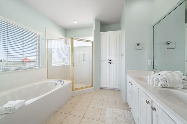 bathroom featuring vanity, separate shower and tub, and tile patterned floors