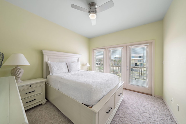 carpeted bedroom with access to outside and ceiling fan