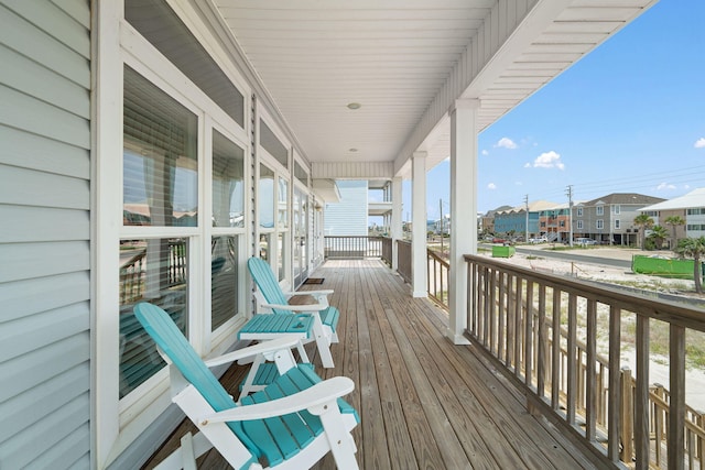 wooden deck featuring covered porch