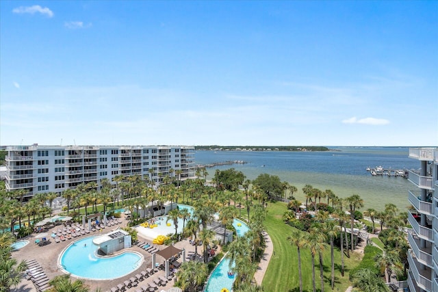 birds eye view of property with a water view