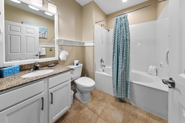 full bathroom featuring toilet, vanity, and shower / tub combo