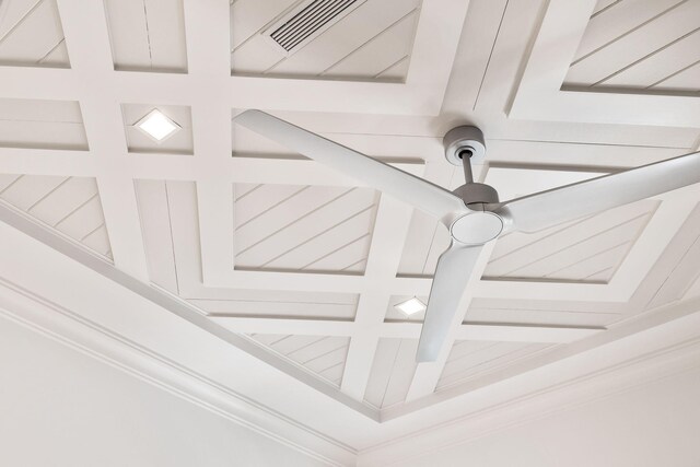 details featuring beamed ceiling and coffered ceiling