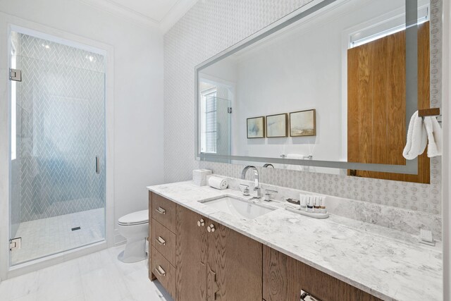 bathroom featuring an enclosed shower, toilet, vanity, tile patterned flooring, and ornamental molding