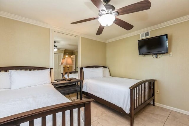 bedroom featuring baseboards, visible vents, crown molding, and a ceiling fan