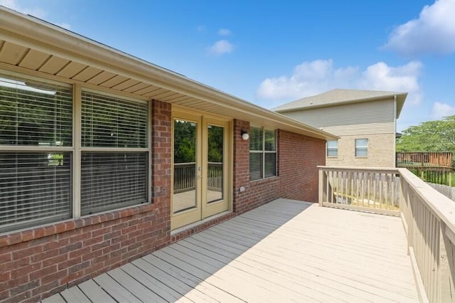 wooden deck featuring french doors