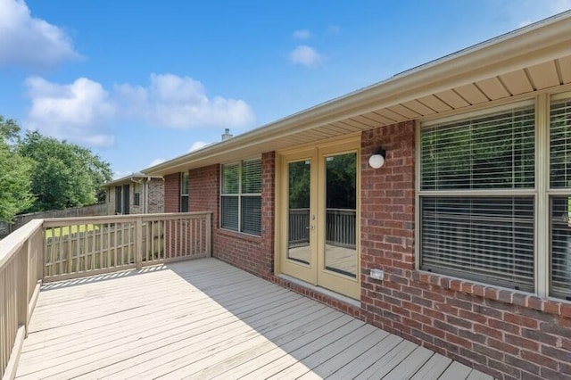 wooden deck featuring french doors