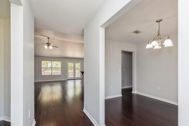 hall with french doors, an inviting chandelier, and dark wood-type flooring