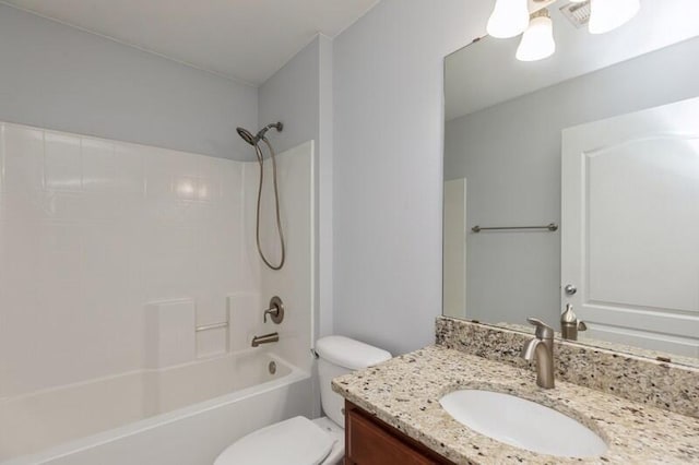 full bathroom with vanity, toilet, and shower / tub combination