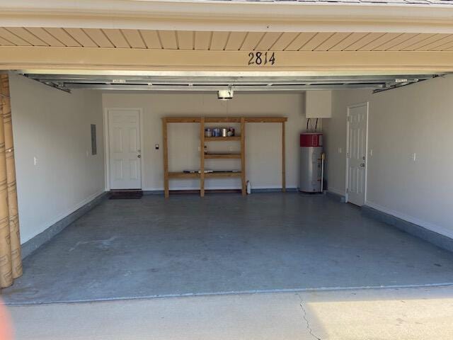 garage with electric water heater and wooden ceiling