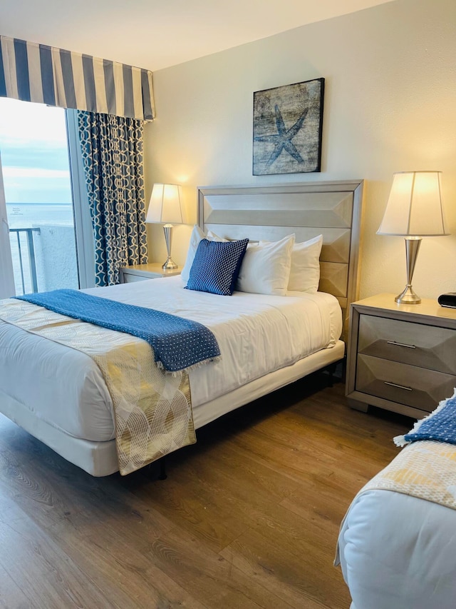 bedroom featuring hardwood / wood-style flooring