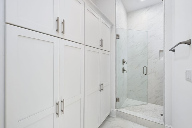 bathroom featuring tile patterned floors and walk in shower