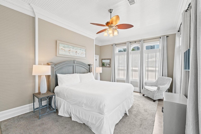 bedroom featuring ceiling fan and crown molding