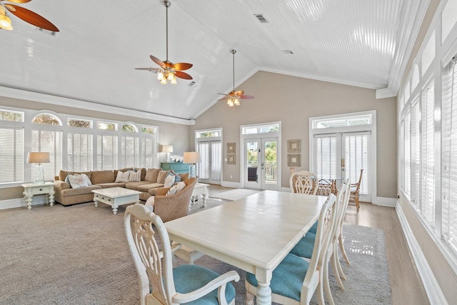 sunroom / solarium with vaulted ceiling and french doors