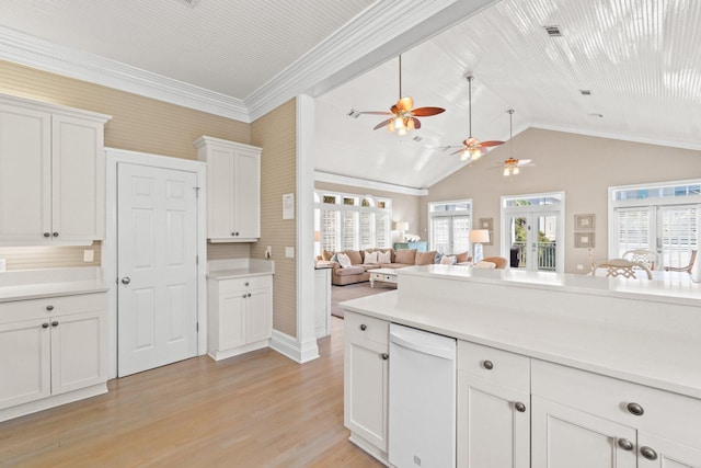 kitchen with white cabinetry, lofted ceiling, white dishwasher, and light wood-type flooring