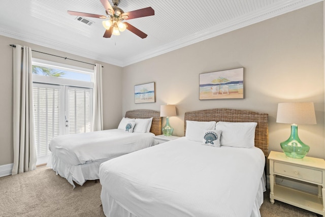 carpeted bedroom with french doors, ornamental molding, and ceiling fan